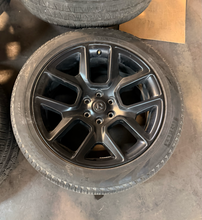 Load image into Gallery viewer, Set of 4 Used OEM 22" '19-'26 RAM 1500 Black Rims 285/45R22 Pirelli Scorpion LT
