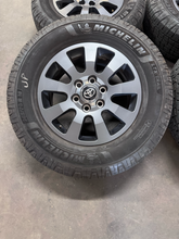 Load image into Gallery viewer, OEM 18" '24-'26 Toyota Land Cruiser Used Wheels 265/70R18 Michelin LTX Trail LT
