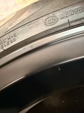 Load image into Gallery viewer, Set of 4 Used Black '19-'26 RAM 1500 22" Wheels 285/45R22 Pirelli All Season LT
