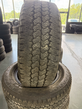 Load image into Gallery viewer, OEM '05-'26 RAM 2500 20" Black Used Rims 285/60R20 Firestone Transforce AT Tires
