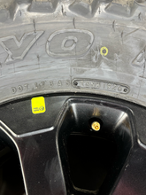 Load image into Gallery viewer, Set of 4 OEM 17" '05-'26 RAM 2500 3500 Power Wagon Wheels 35/12.50R17 Toyo MT E
