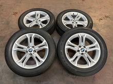 Load image into Gallery viewer, Set of 4 Used OEM 18" Silver '18-'21 BMW X3 Wheels on 225/60R18 Bridgestone H/P
