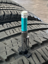 Load image into Gallery viewer, OEM '19-'26 RAM 1500 20" Matte Black Used Wheels on 275/55R20 Bridgestone HL LT
