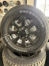 Load image into Gallery viewer, OEM '05-'26 RAM 2500 3500 20" Black Rims 285/60R20 Firestone Transforce AT Tires

