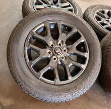 Load image into Gallery viewer, Set of OEM Takeoff '22-'26 Toyota Tundra Dark Charcoal Rims 265/60R20 Tires LT
