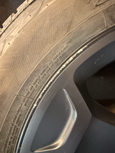 Load image into Gallery viewer, Set of Used '19-'26 RAM 1500 Black Clad Wheels on 275/55R20 Bridgestone Tires LT
