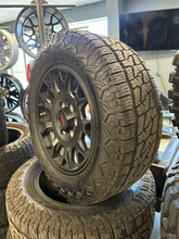 Load image into Gallery viewer, OEM '24-'26 Toyota Tacoma TRD Black Used Wheels 265/65R18 Nitto Nomad Grappler
