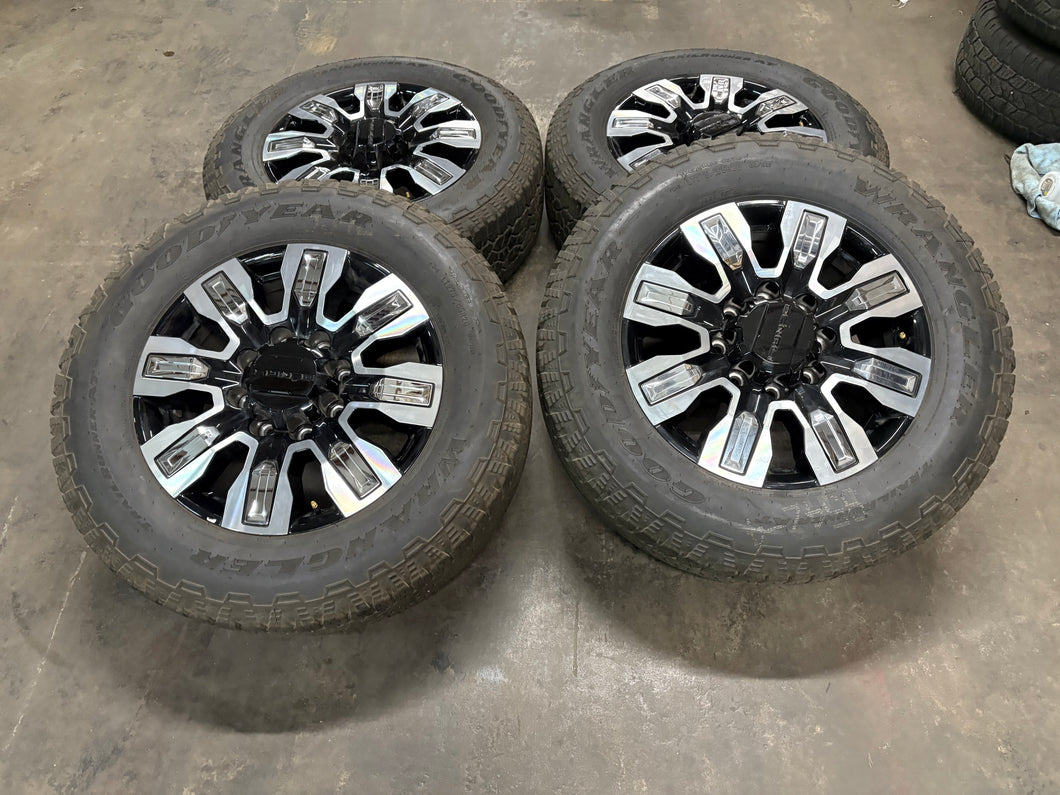 Set of Used '11-'24 GMC Sierra 2500 Black Milled Wheels 275/65R20 Goodyear E LT