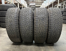 Load image into Gallery viewer, Set of Used &#39;11-&#39;24 GMC Sierra 2500 Black Milled Wheels 275/65R20 Goodyear E LT
