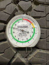 Load image into Gallery viewer, Set of Used &#39;11-&#39;24 GMC Sierra 2500 Black Milled Wheels 275/65R20 Goodyear E LT
