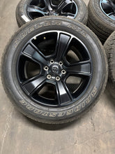 Load image into Gallery viewer, Set of 4 Used OEM Matte Black &#39;19-&#39;25 RAM 1500 Wheels on 275/55R20 Alenza H/L LT
