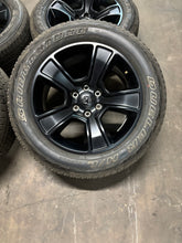 Load image into Gallery viewer, Set of 4 Used OEM Matte Black &#39;19-&#39;25 RAM 1500 Wheels on 275/55R20 Alenza H/L LT
