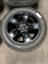 Load image into Gallery viewer, Set of 4 Used OEM Matte Black &#39;19-&#39;25 RAM 1500 Wheels on 275/55R20 Alenza H/L LT
