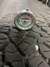 Load image into Gallery viewer, Set of 4 Used &#39;11-&#39;24 GMC Sierra 2500 Black Milled Rims 275/65R20 Goodyear AT LT
