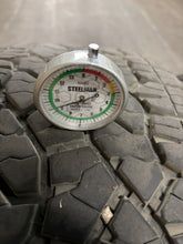 Load image into Gallery viewer, Set of 4 Used &#39;11-&#39;24 GMC Sierra 2500 Black Milled Rims 275/65R20 Goodyear AT LT
