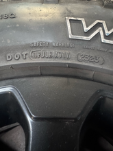 Load image into Gallery viewer, OEM '05-'26 RAM 2500 Power Wagon Used Black Rims 285/70R17 Goodyear Duratrac LT
