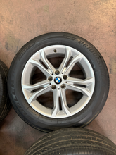 Load image into Gallery viewer, Set of 4 Used OEM 18" Silver '18-'21 BMW X3 Wheels on 225/60R18 Bridgestone H/P
