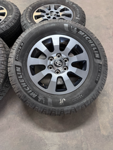 Load image into Gallery viewer, OEM 18" '24-'26 Toyota Land Cruiser Used Wheels 265/70R18 Michelin LTX Trail LT
