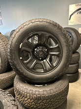 Load image into Gallery viewer, OEM '99-'26 Chevrolet Tahoe Suburban Black Steel Wheels 275/60R20 Goodyear Tires
