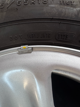 Load image into Gallery viewer, OEM '19-'26 RAM 1500 OEM Steel Used Wheels on 275/65R18 Goodyear H/T Tires LT
