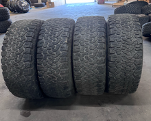 Load image into Gallery viewer, OEM '05-'26 Ford F-150 Raptor 17" Used Wheels 170268 315/70R17 BFGoodrich AT LT

