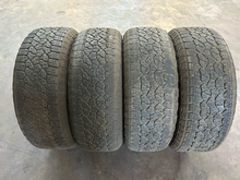 Load image into Gallery viewer, Set of 4 Used AT4 '00-'26 GMC Sierra 1500 Wheels 275/60R20 Goodyear AT Tires LT
