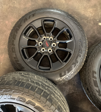 Load image into Gallery viewer, OEM '22-'26 Toyota Tundra Black TRD 20" Used Wheels on 265/60R20 Falken AT3WA LT
