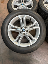 Load image into Gallery viewer, Set of 4 Used OEM 18" Silver '18-'21 BMW X3 Wheels on 225/60R18 Bridgestone H/P
