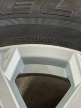 Load image into Gallery viewer, OEM '22-'26 Toyota Tundra 18" Silver Wheels 265/70R18 Bridgestone Dueler H/T LT
