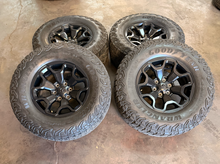 Load image into Gallery viewer, Set of Used '19-'26 RAM 1500 TRX Black OEM Wheels 325/65R18 Goodyear AT Tires LT
