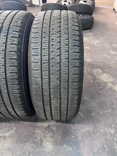 Load image into Gallery viewer, OEM '19-'26 RAM 1500 20" Matte Black Used Wheels on 275/55R20 Bridgestone HL LT
