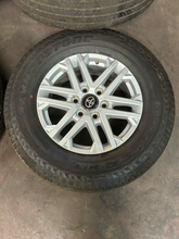 Load image into Gallery viewer, OEM '22-'26 Toyota Tundra 18" Silver Wheels 265/70R18 Bridgestone Dueler H/T LT
