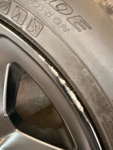Load image into Gallery viewer, Set of 4 Used Black '19-'26 RAM 1500 22" Wheels 285/45R22 Pirelli All Season LT
