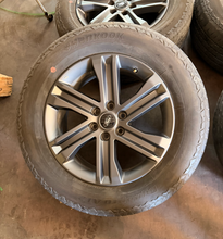 Load image into Gallery viewer, Set of Used '05-'26 Ford F150 Dark Grey Wheels 275/60R20 Hankook Dynapro AT2 LT

