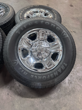 Load image into Gallery viewer, OEM '05-'26 RAM 2500 Steel Used Chrome Clad Wheels on 275/70R18 Firestone HT2 LT
