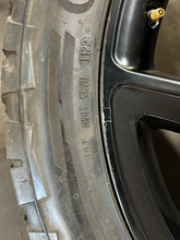 Load image into Gallery viewer, Set of 4 Used 22" Black '19-'26 RAM 1500 Wheels 285/45R22 Terrain Contact AT LT
