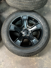 Load image into Gallery viewer, Set of 4 Used '19-'26 RAM 1500 Black 2723 Wheels 275/55R20 Bridgestone Alenza LT
