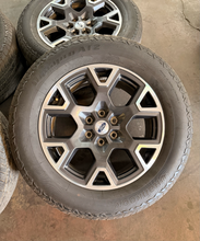 Load image into Gallery viewer, Set of 4 Used '05-'26 Ford F-150 Charcoal &amp; Machined Wheels 275/60R20 Hankook LT
