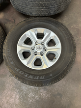 Load image into Gallery viewer, OEM '05-'24 Toyota 4Runner 17" Silver Used Wheels 265/70R17 Dunlop A20 Tires LT
