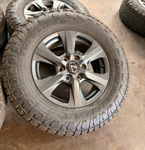 Load image into Gallery viewer, Set of Used '22-'26 Lexus LX600 74400 18" OEM Wheels 265/70R18 Toyo AT3 Tires LT

