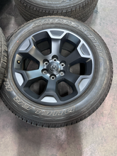 Load image into Gallery viewer, OEM '19-'26 RAM 1500 Matte Black 20" Used Wheels on 275/55R20 Bridgestone  LT
