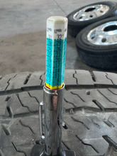 Load image into Gallery viewer, OEM '22-'26 Toyota Tundra 18" Used Black Machined Rims 265/70R18 Michelin LTX LT
