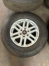 Load image into Gallery viewer, OEM '22-'26 Toyota Tundra 18" Silver Wheels 265/70R18 Bridgestone Dueler H/T LT
