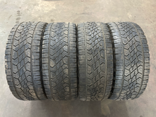Load image into Gallery viewer, Set of 4 Used 22" Black '19-'26 RAM 1500 Wheels 285/45R22 Terrain Contact AT LT
