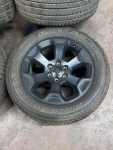 Load image into Gallery viewer, OEM '19-'26 RAM 1500 Matte Black 20" Used Wheels on 275/55R20 Bridgestone  LT
