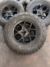 Load image into Gallery viewer, OEM '07-'26 Jeep Wrangler 17" Black Used Rims 285/70R17 BFGoodrich AT Tires LT
