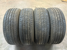 Load image into Gallery viewer, Set of OEM 20" '22-'26 Toyota Tundra Black TRD Rims on 265/60R20 Bridgestone LT
