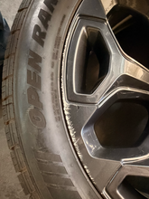 Load image into Gallery viewer, Set of Used '19-'26 RAM 1500 2727 Dark Charcoal Rims 285/45R22 Open Range HTS LT
