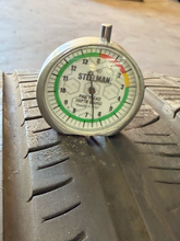 Load image into Gallery viewer, Set of 4 Used Black '19-'26 RAM 1500 22" Wheels 285/45R22 Pirelli All Season LT

