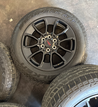 Load image into Gallery viewer, OEM '22-'26 Toyota Tundra Black TRD 20" Used Wheels on 265/60R20 Falken AT3WA LT
